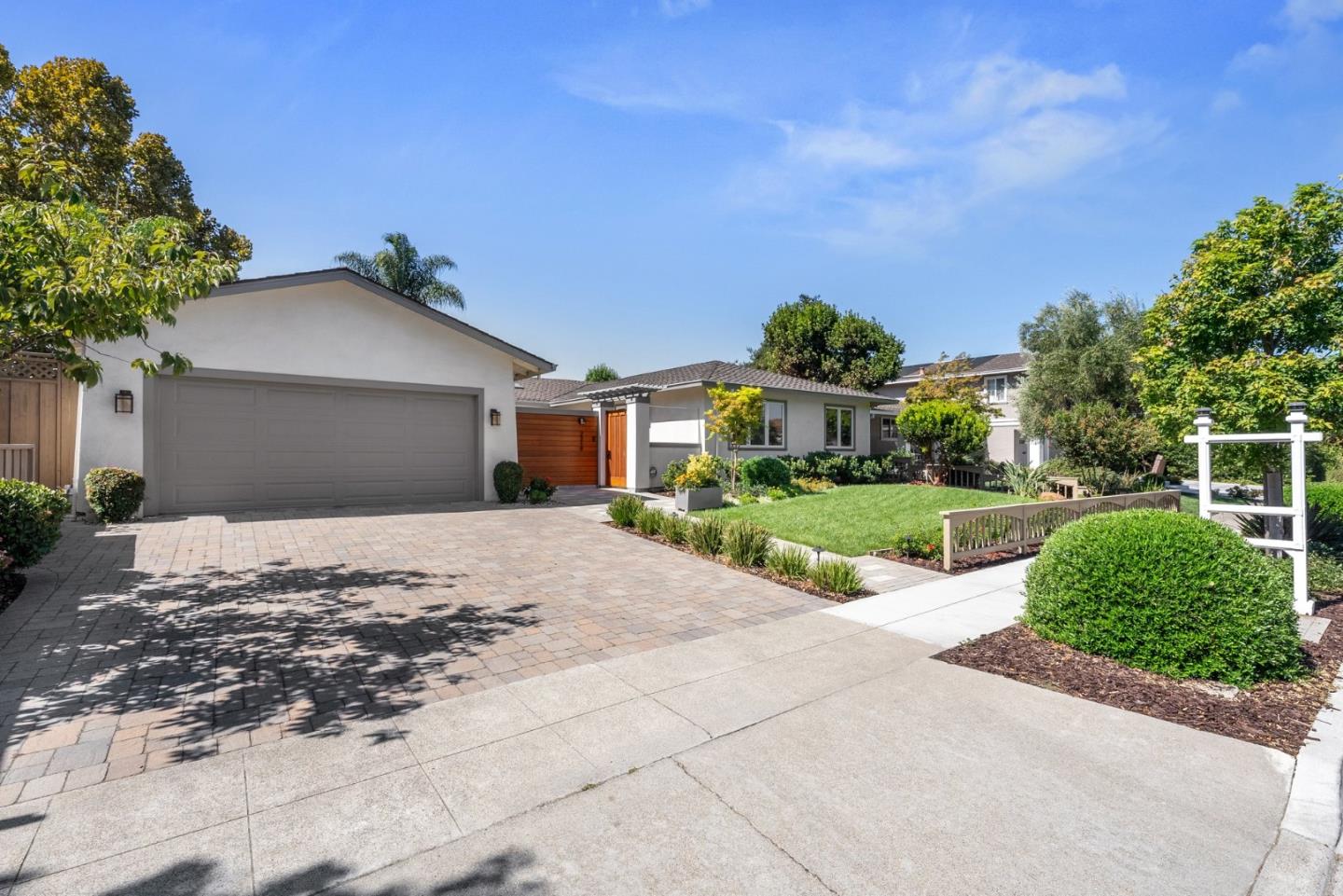 2219 Maykirk Road San Jose, CA 95124 - Photo 5 of 100 a view of a house with a yard and potted plants