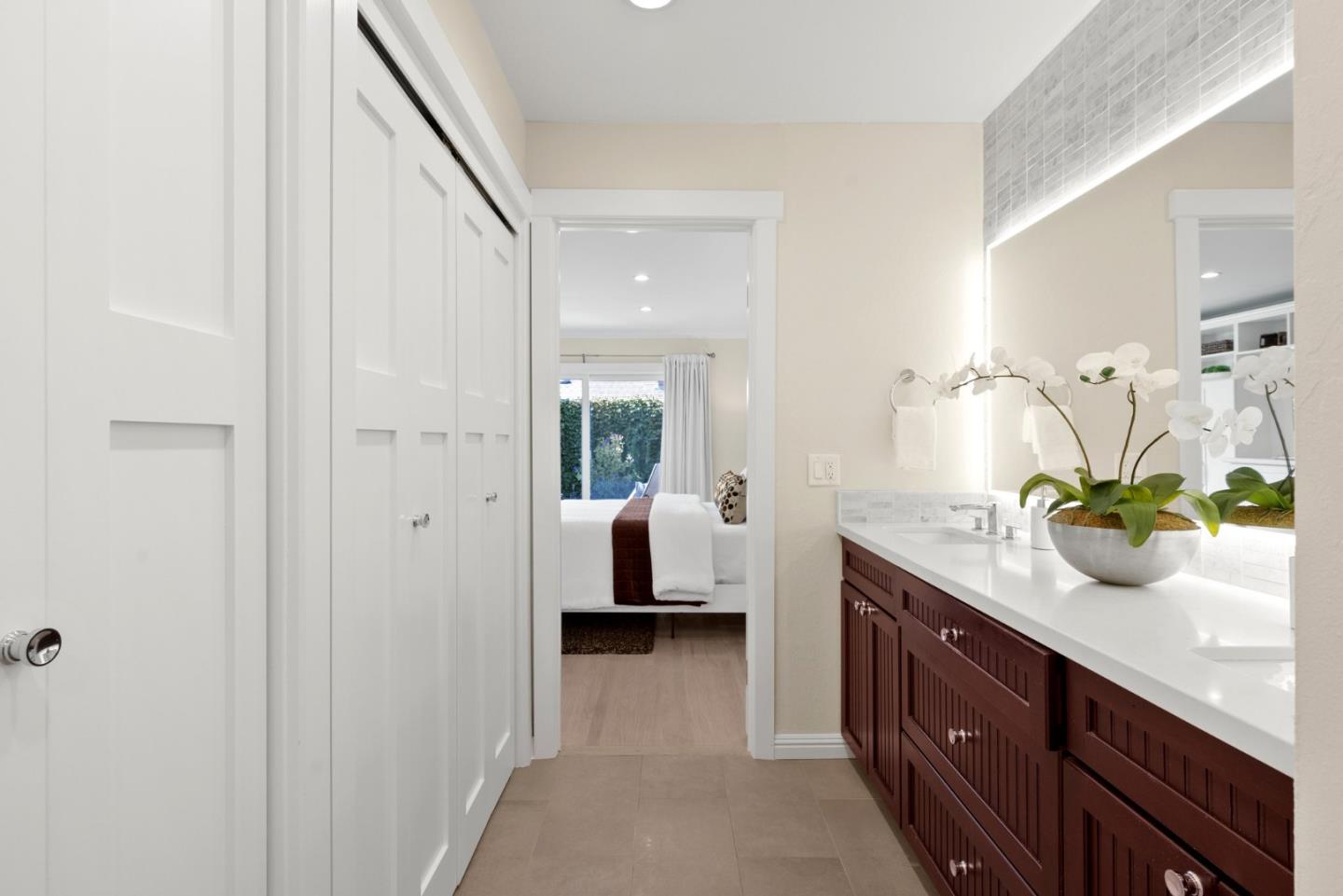 2219 Maykirk Road San Jose, CA 95124 - Photo 63 of 100 a en suite bathroom with a granite countertop sink and mirror