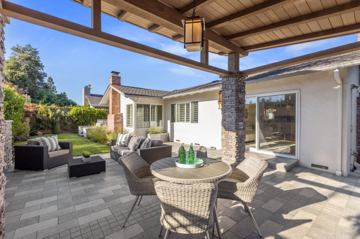 2219 Maykirk Road San Jose, CA 95124 - Photo 68 of 100 a view of a patio with couches table and chairs and potted plants
