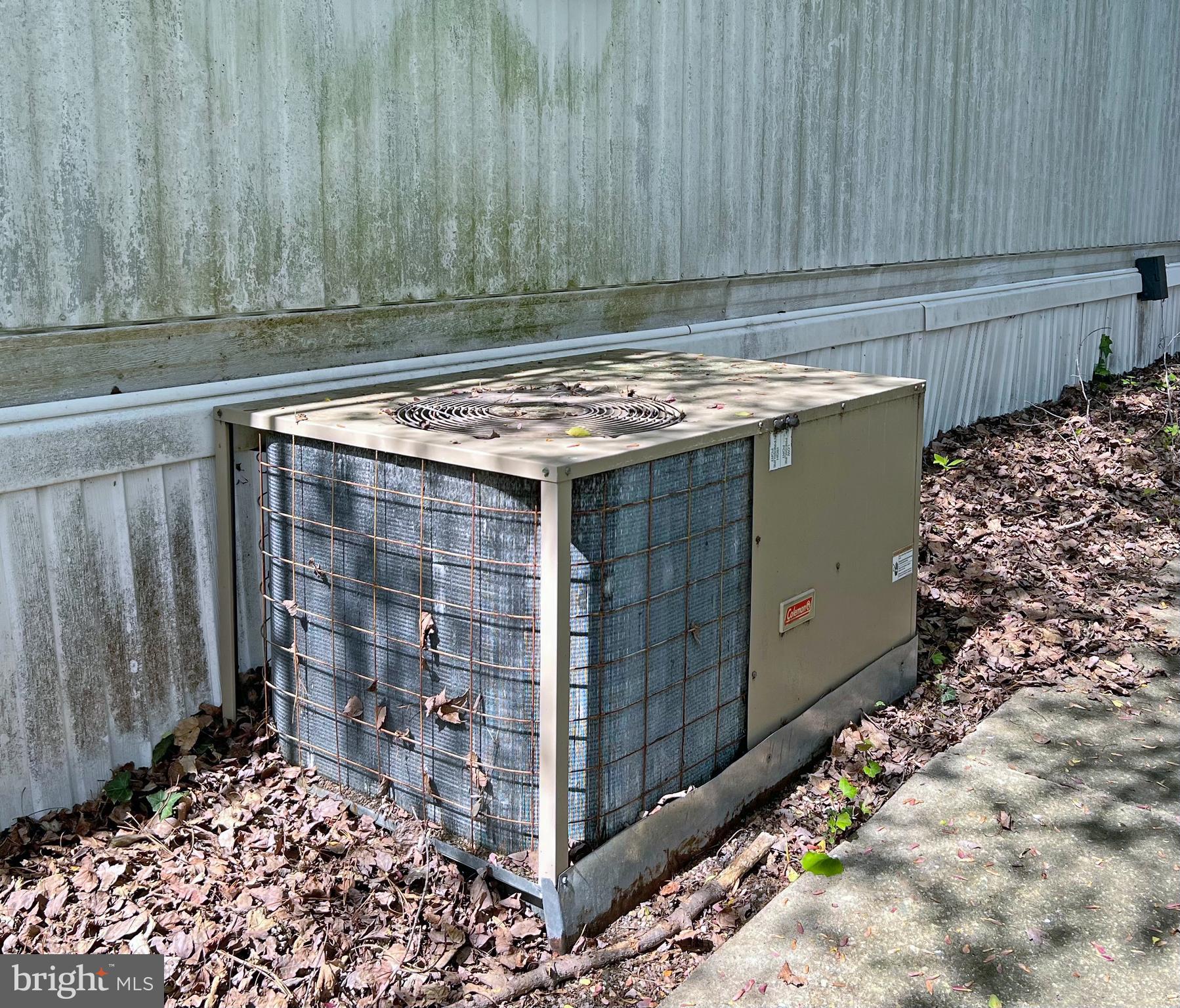 17138 Holly Road, Unit 69 Lewes, DE 19958 - Photo 16 of 23 AC Condenser
