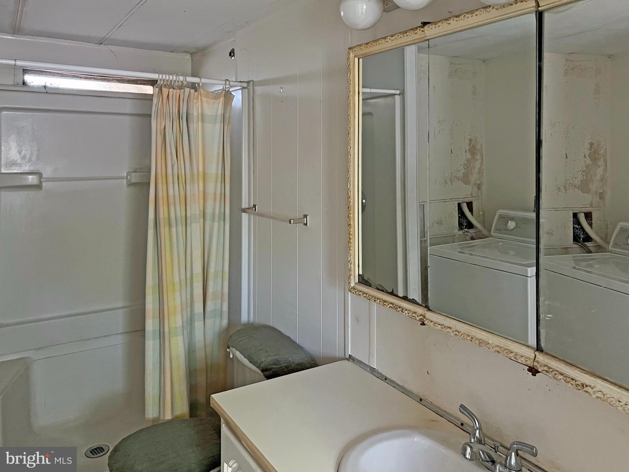 17138 Holly Road, Unit 69 Lewes, DE 19958 - Photo 10 of 23 Full Bath with Washer & Dryer