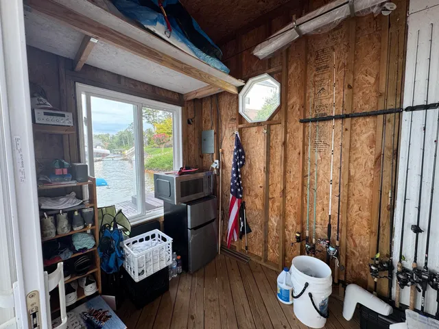 a view of a livingroom with furniture and a chandelier