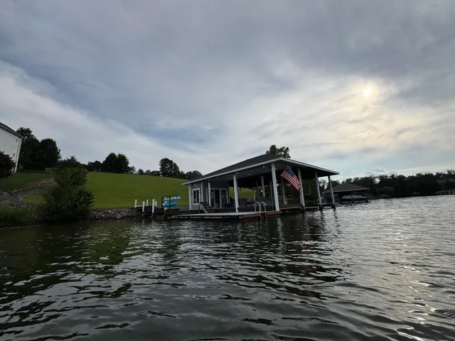 a view of a lake with a big yard