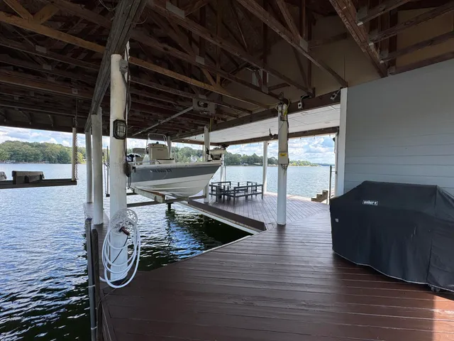 a view of outdoor space with wooden floor