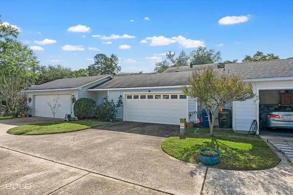 a view of a house with a patio