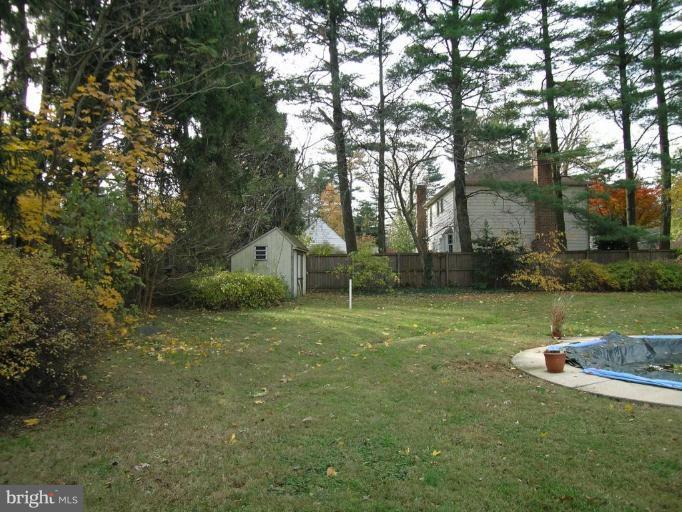 9217 Frederick Road Ellicott City, MD 21042 - Photo 19 of 22 a view of a house with a yard