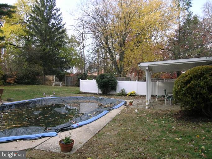 9217 Frederick Road Ellicott City, MD 21042 - Photo 22 of 22 a backyard of a house with lots of green space