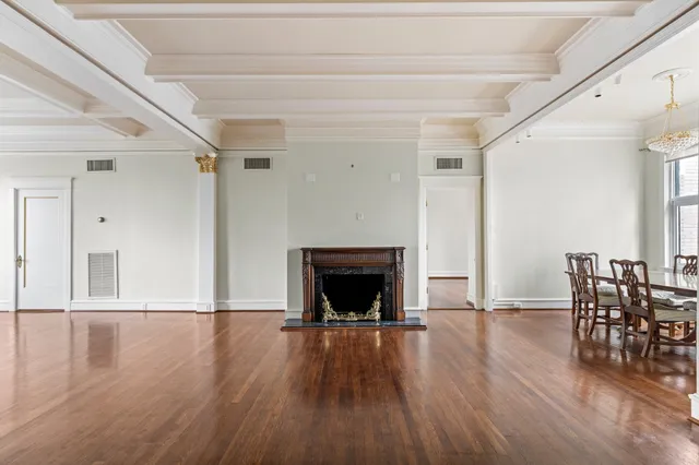 a view of a livingroom with furniture and a fireplace