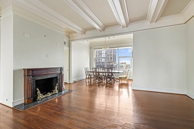 a view of dining room with furniture and wooden floor