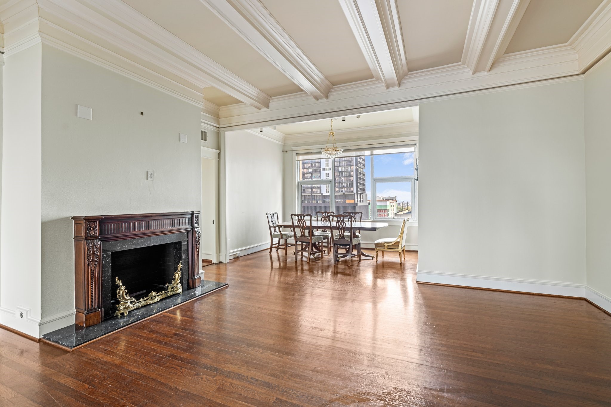 1700 Main Street, Unit 7B Houston, TX 77002 - Photo 20 of 50 a view of dining room with furniture and wooden floor
