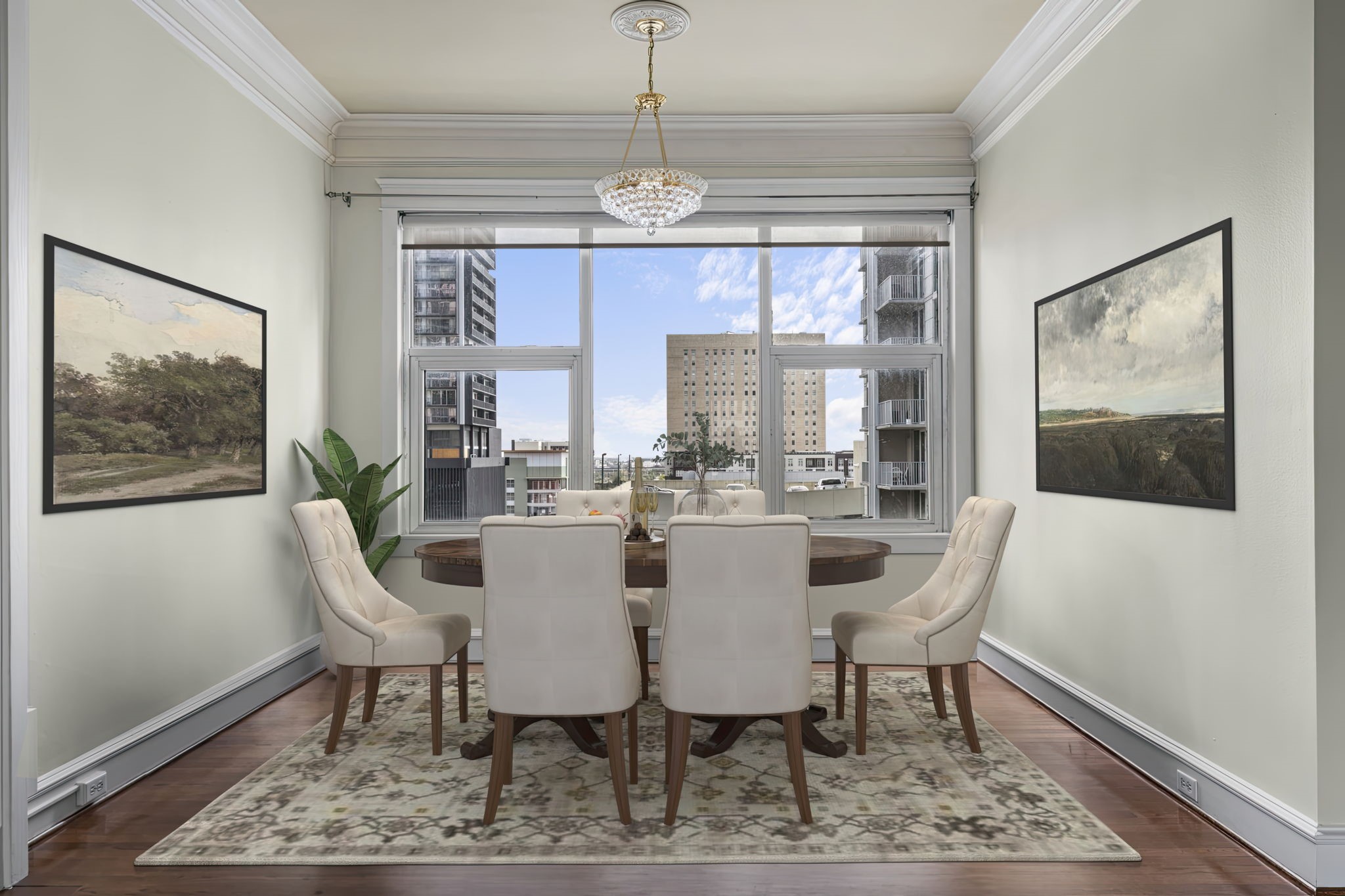 1700 Main Street, Unit 7B Houston, TX 77002 - Photo 40 of 50 a dining room with furniture a rug and a chandelier