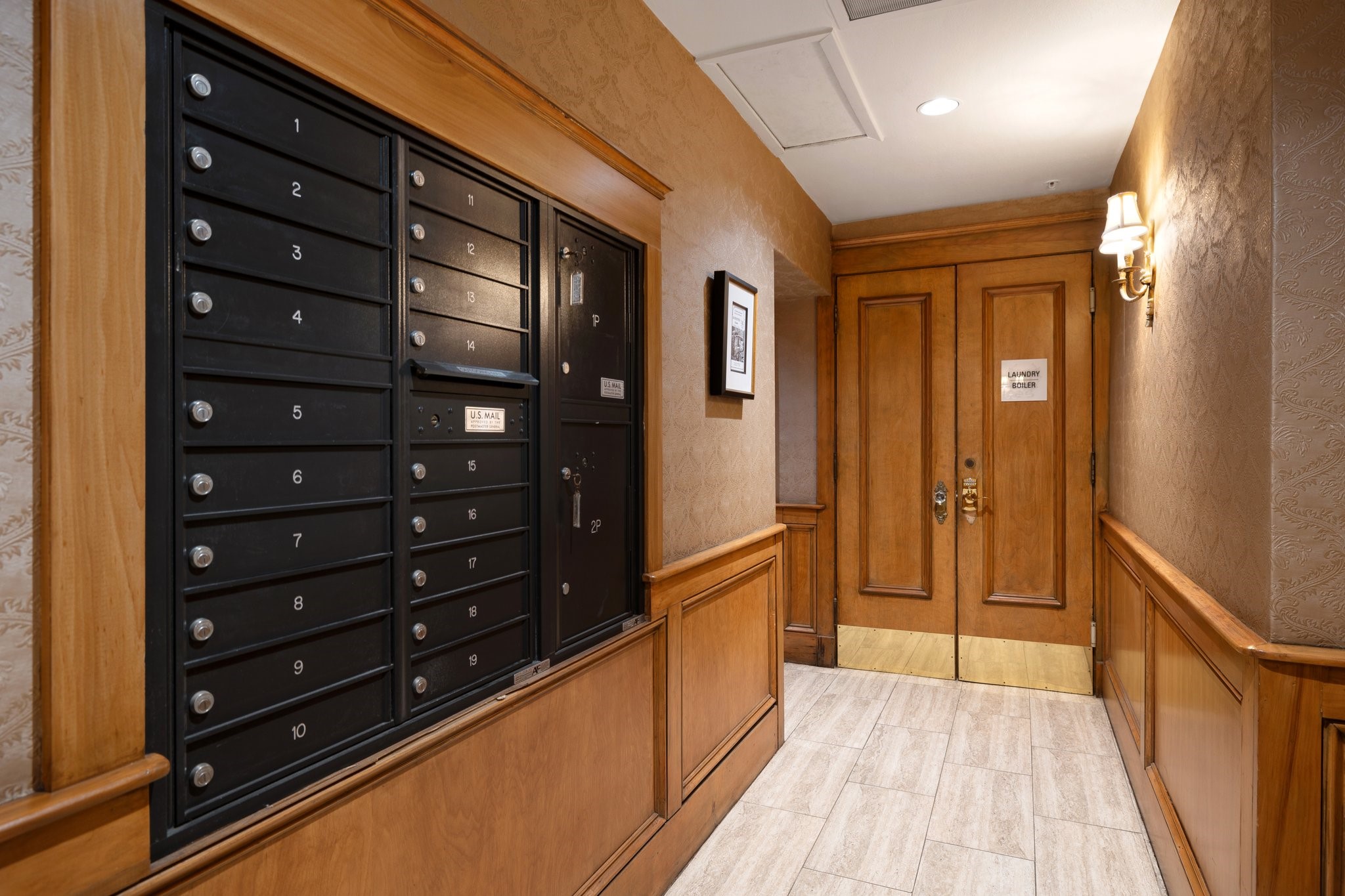 1700 Main Street, Unit 7B Houston, TX 77002 - Photo 44 of 50 a view of a hallway with wooden floor and staircase