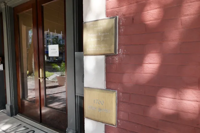 a view of street with large trees