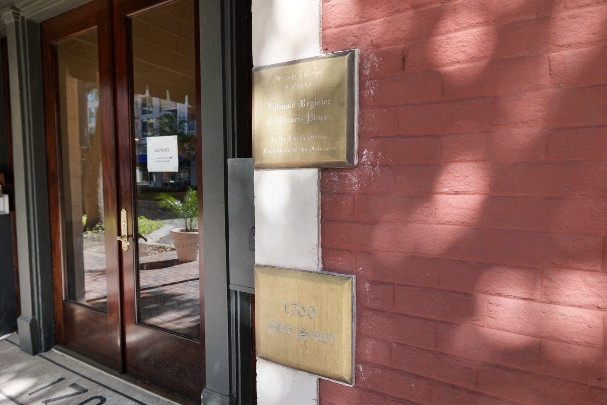 1700 Main Street, Unit 7B Houston, TX 77002 - Photo 46 of 50 a bathroom with a glass shower door