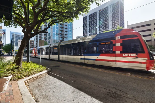 a view of a city with tall buildings