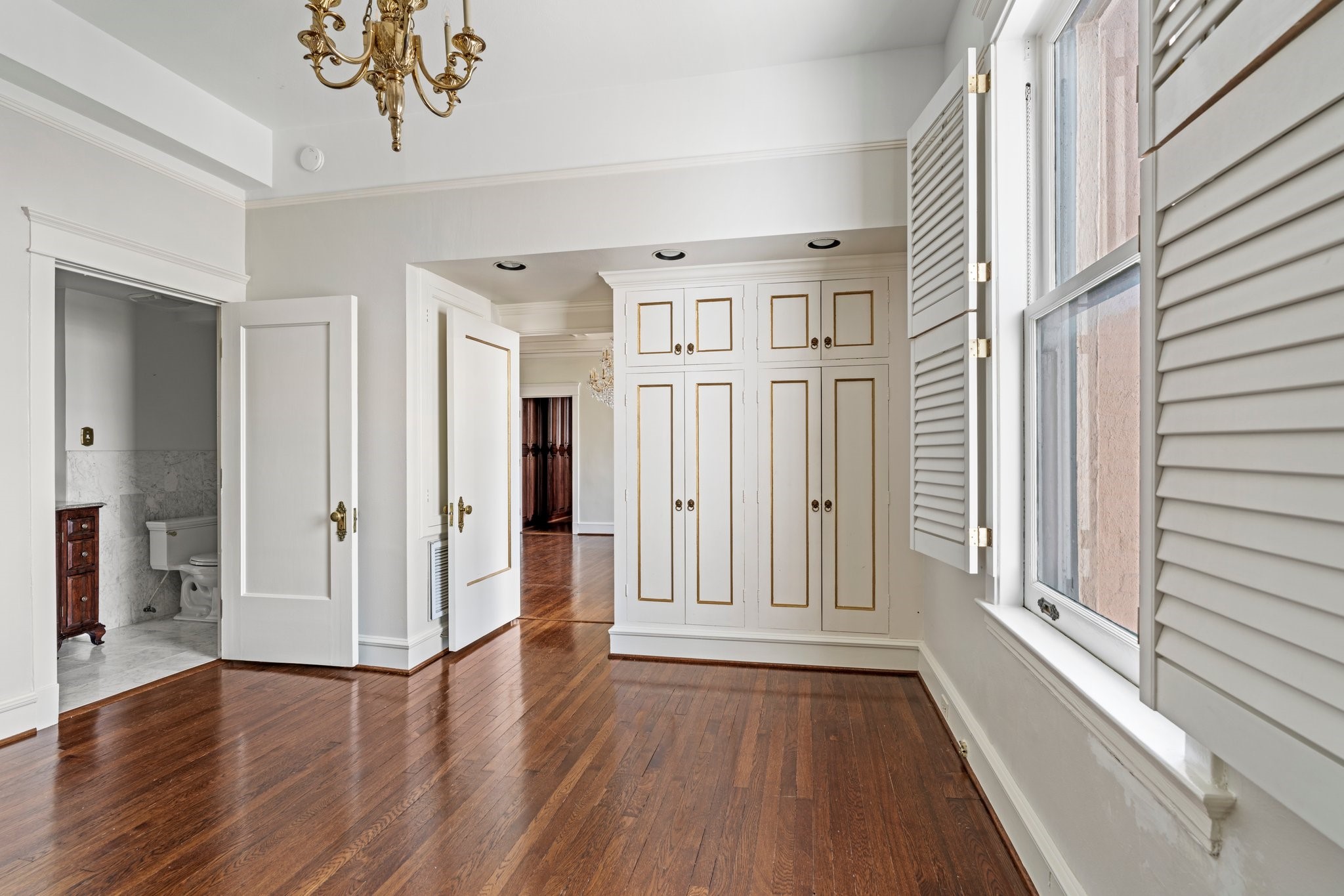 1700 Main Street, Unit 7B Houston, TX 77002 - Photo 6 of 50 a view of an entryway with wooden floor