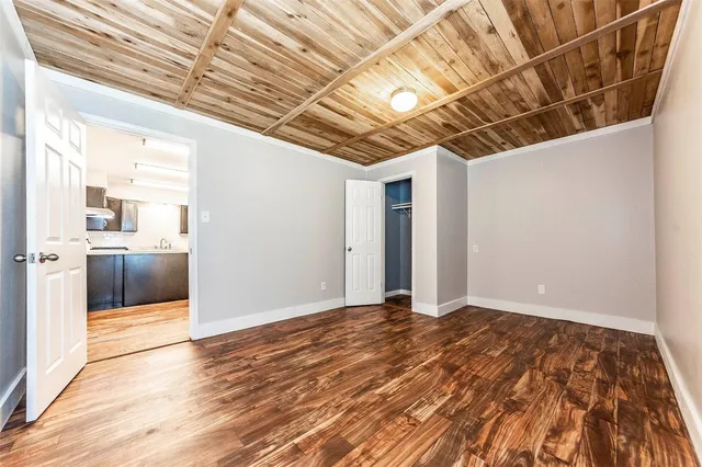 a view of a livingroom with wooden floor