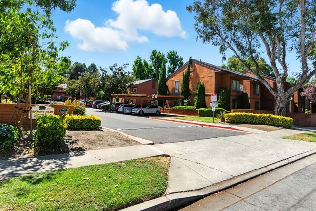 a view of street with houses