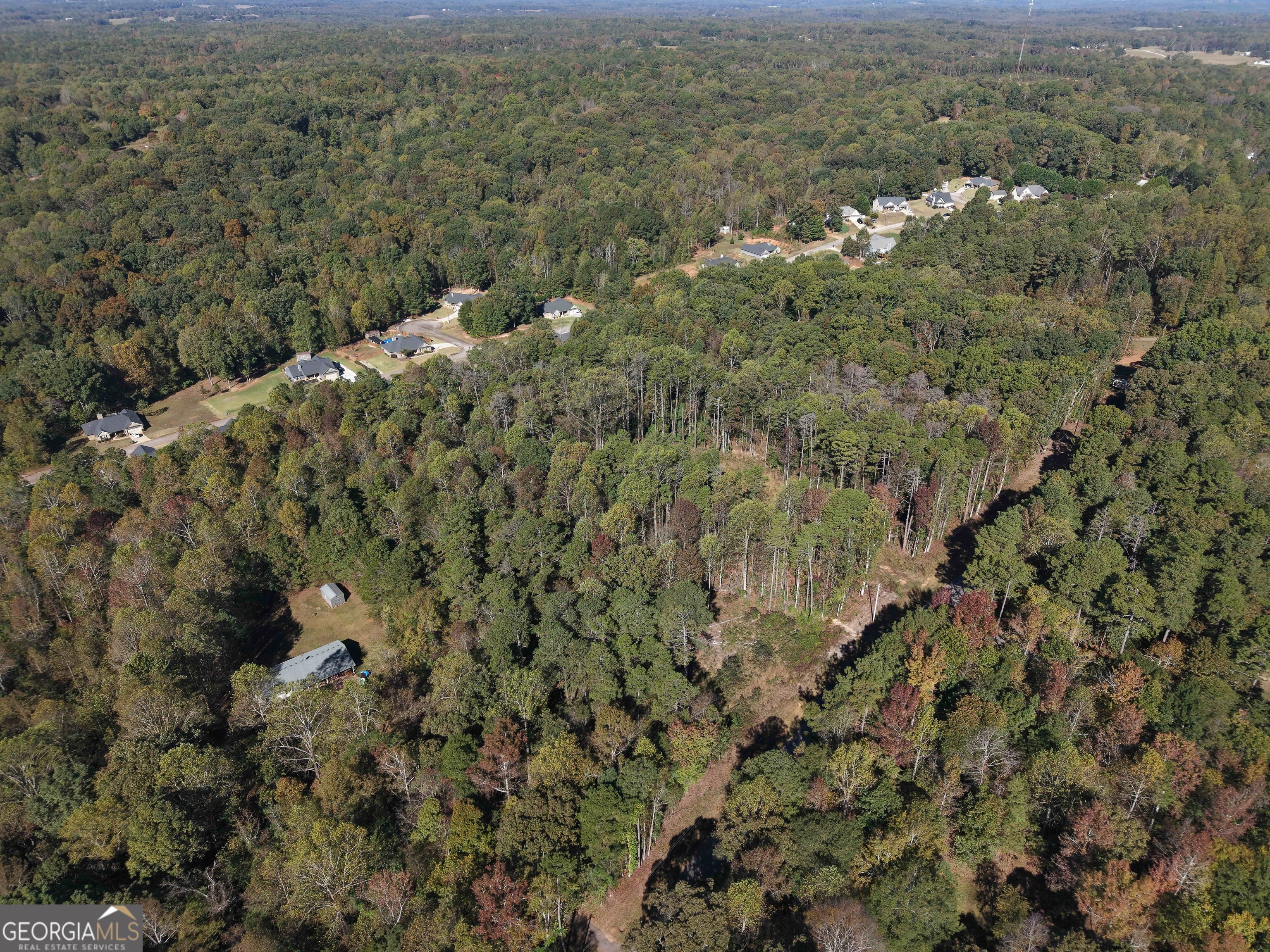 0 Ridgewood Drive Pendergrass, GA 30567 - Photo 5 of 11 a view of a city with lush green forest
