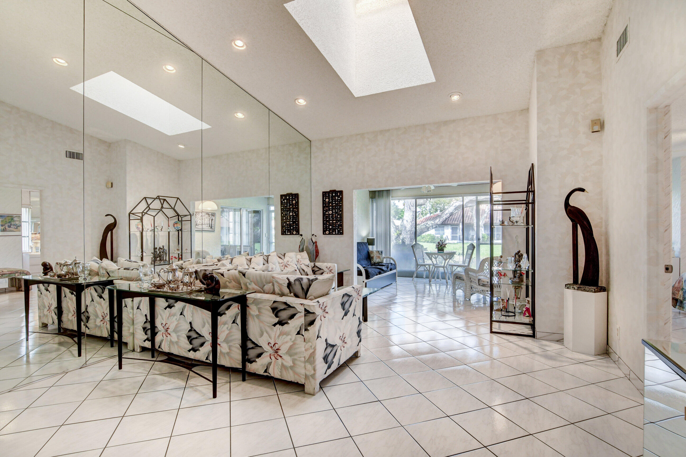 6359 Mill Pointe Circle Delray Beach, FL 33484 - Photo 13 of 57 Living room and Florida Room extended