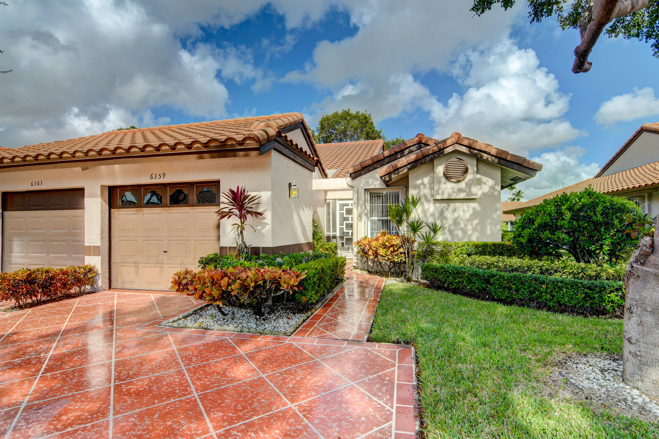 6359 Mill Pointe Circle Delray Beach, FL 33484 - Photo 4 of 57 Park two cars in front of the garage