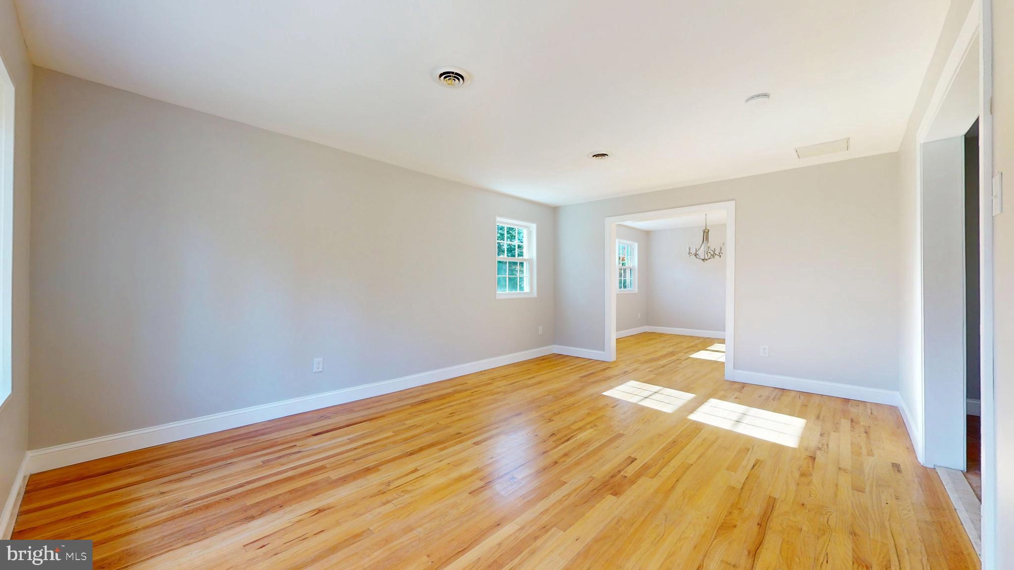 119 East Collings Drive Williamstown, NJ 08094 - Photo 16 of 61 a view of empty room with wooden floor