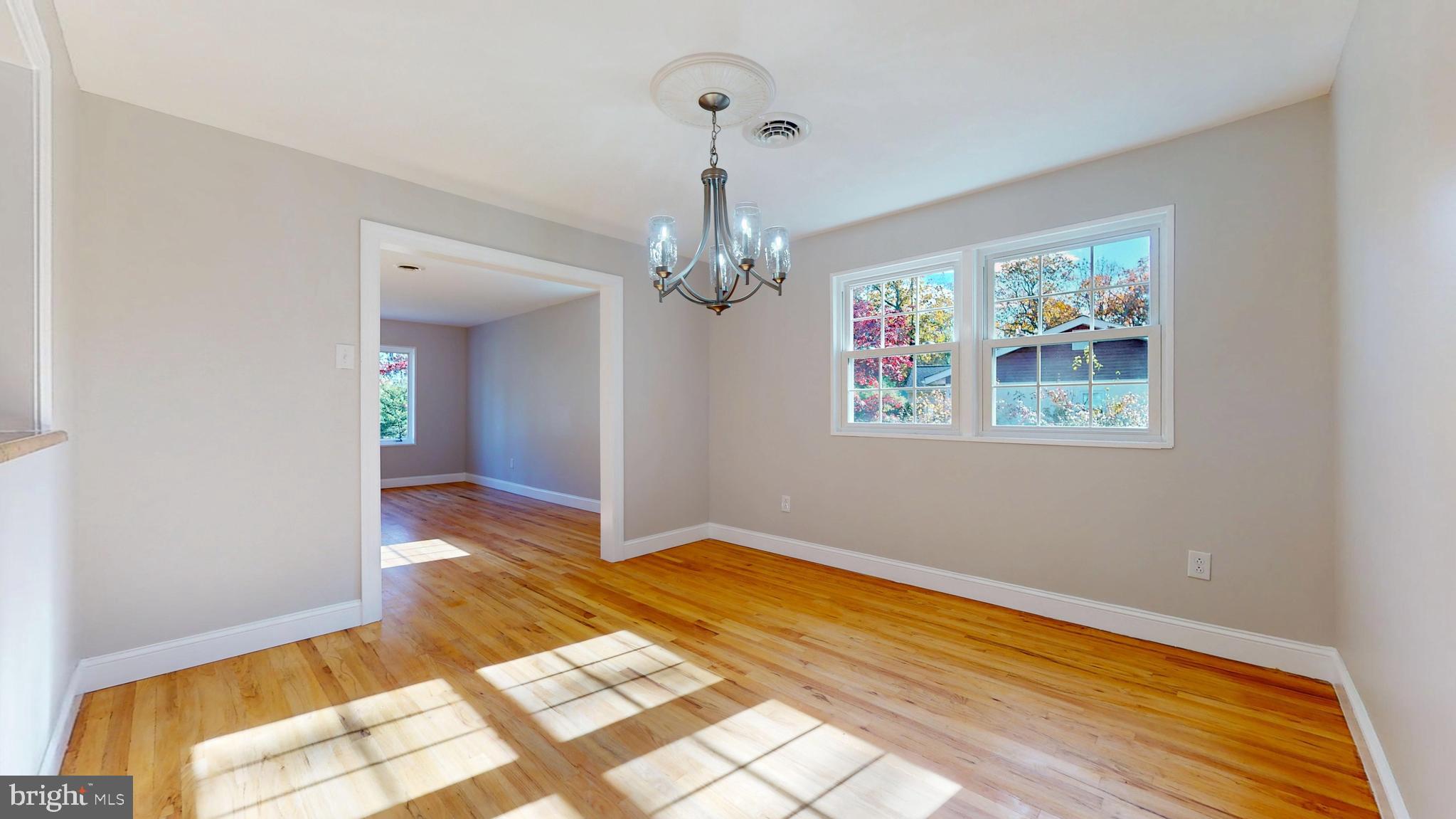 119 East Collings Drive Williamstown, NJ 08094 - Photo 17 of 61 a view of livingroom with hallway and wooden floor