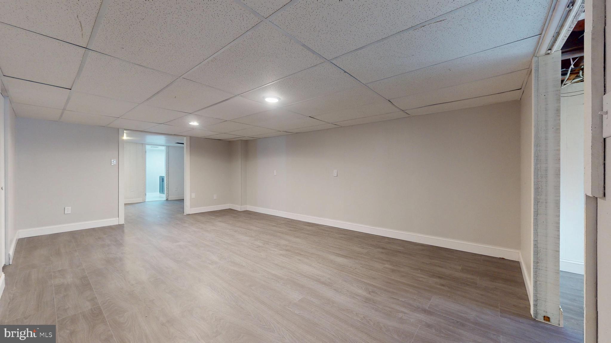 119 East Collings Drive Williamstown, NJ 08094 - Photo 34 of 61 a view of an empty room with wooden floor