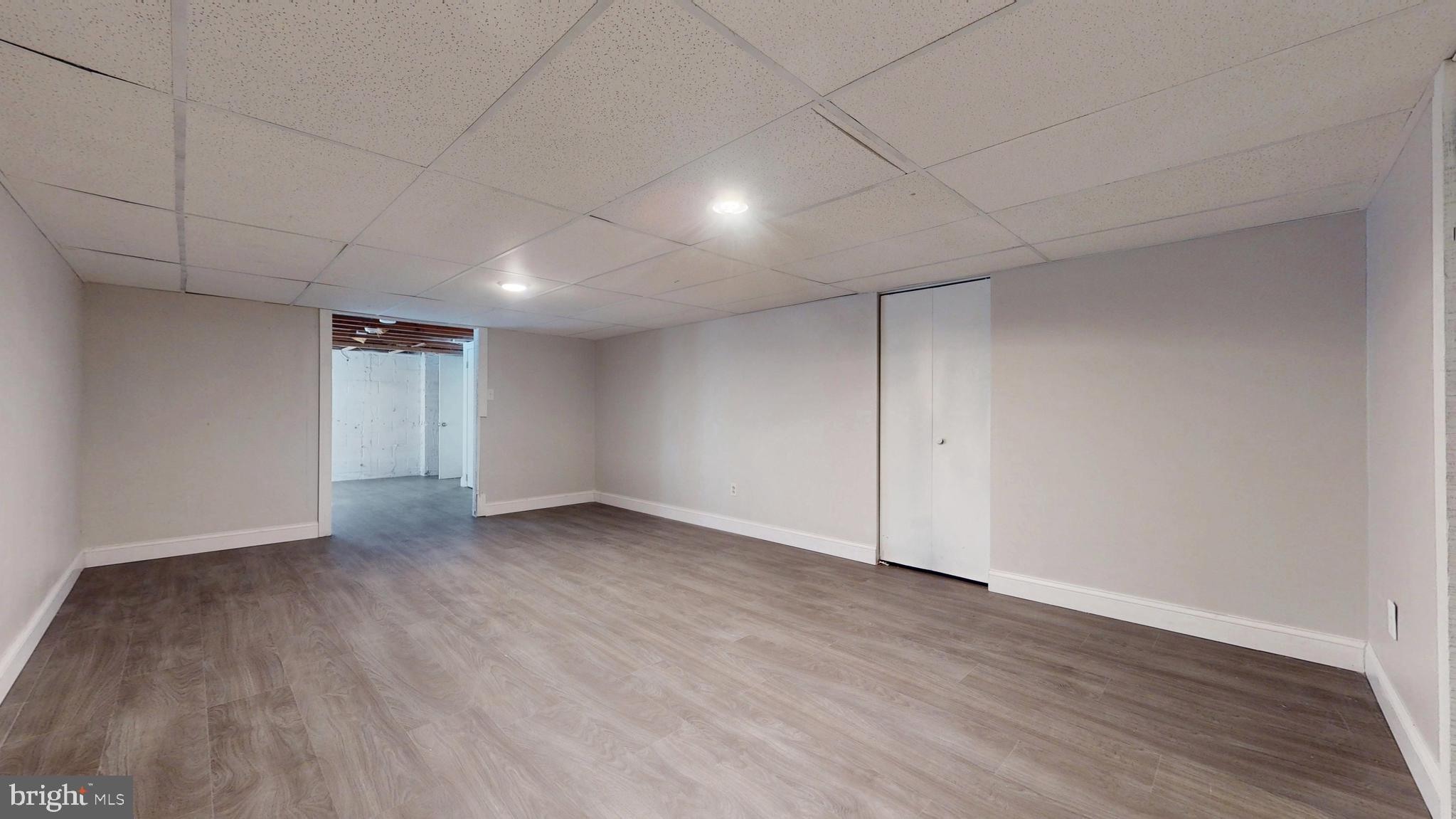 119 East Collings Drive Williamstown, NJ 08094 - Photo 35 of 61 a view of an empty room with wooden floor