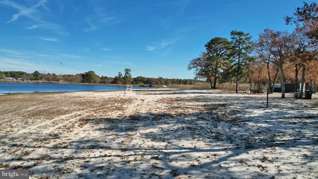 an aerial view of house with yard