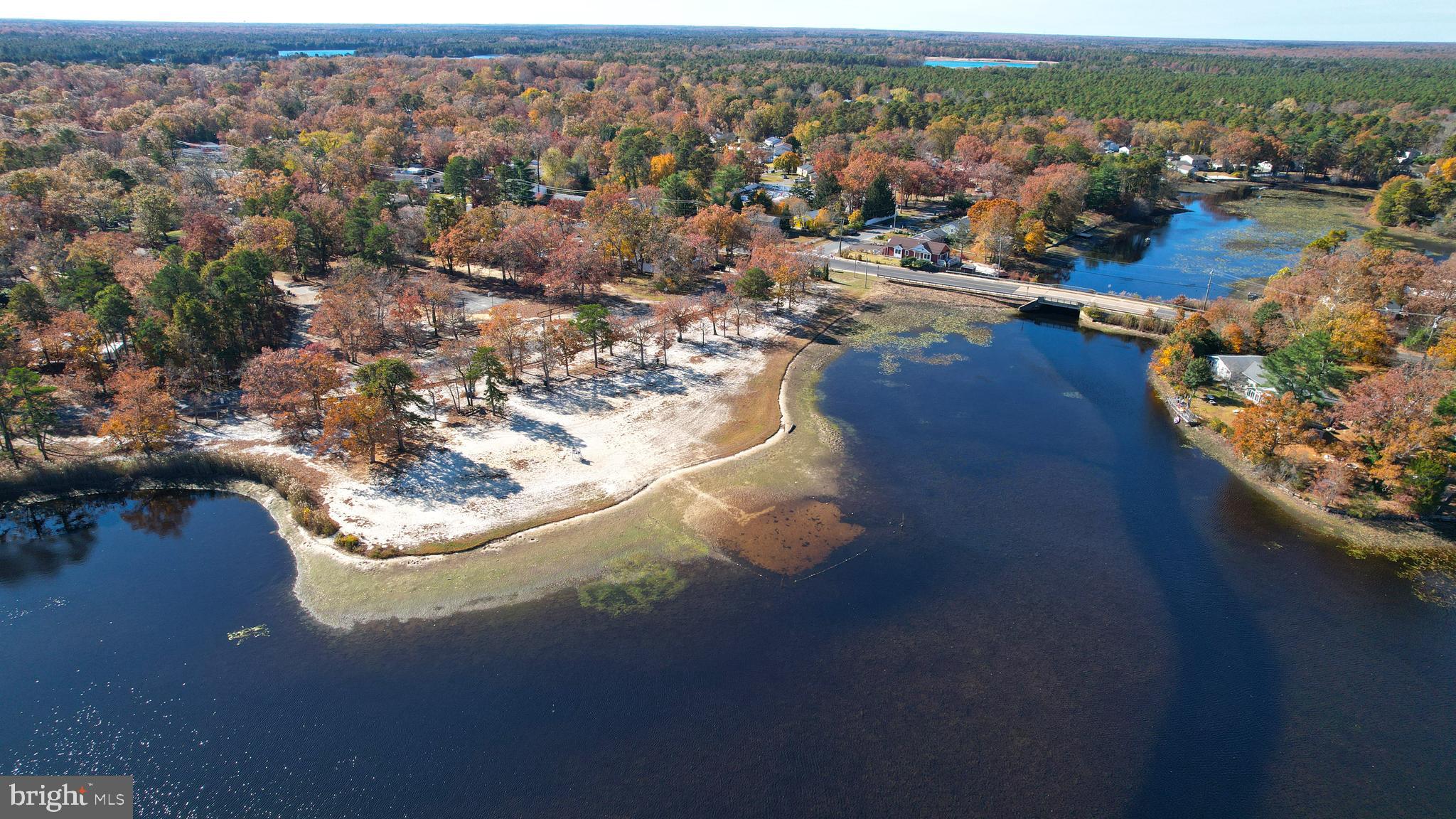 119 East Collings Drive Williamstown, NJ 08094 - Photo 42 of 61 an aerial view of lake and residential houses with outdoor space
