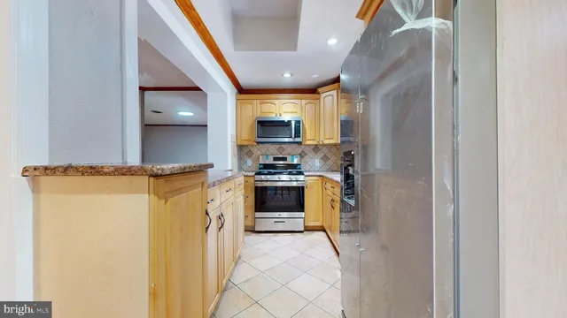 a view of livingroom with kitchen and dining room