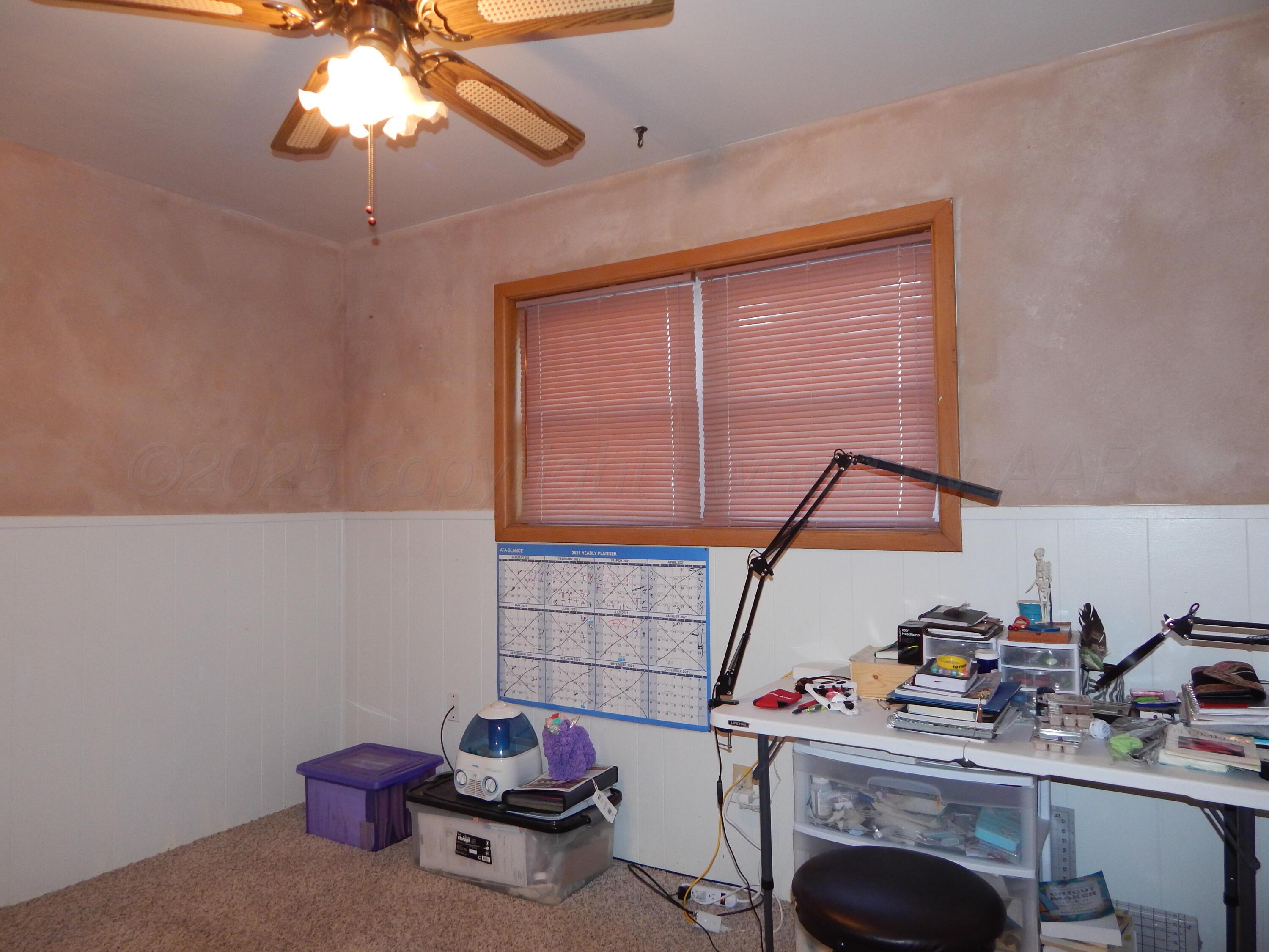 4205 Highway 83 Wellington, TX 79095 - Photo 34 of 52 a room with storage and utility