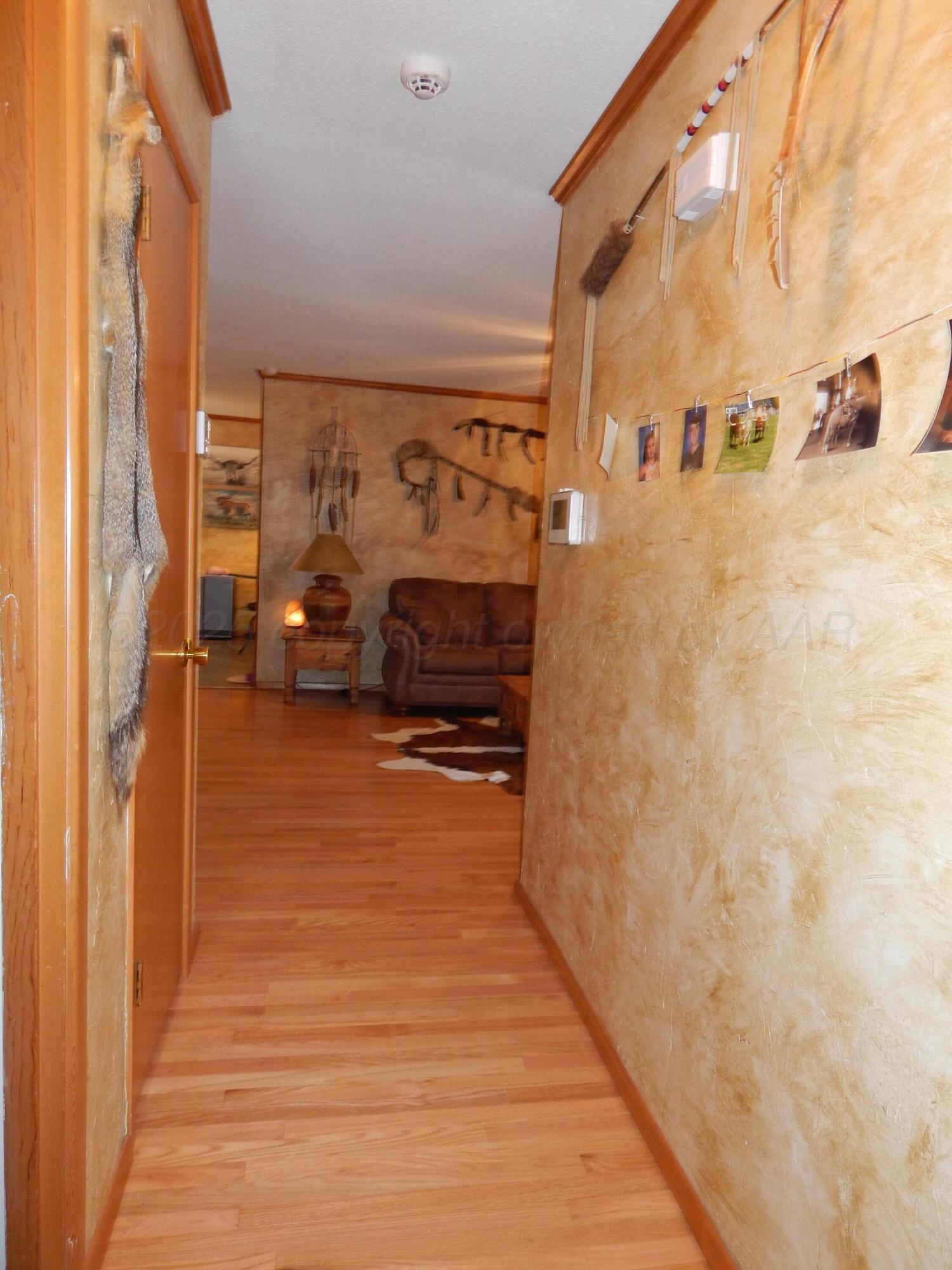 4205 Highway 83 Wellington, TX 79095 - Photo 36 of 52 a view of a entryway door with furniture