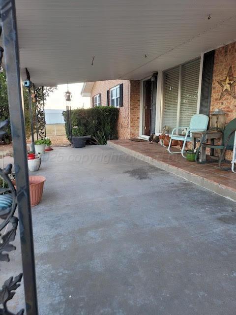 4205 Highway 83 Wellington, TX 79095 - Photo 38 of 52 a view of a chairs and table in front of a house