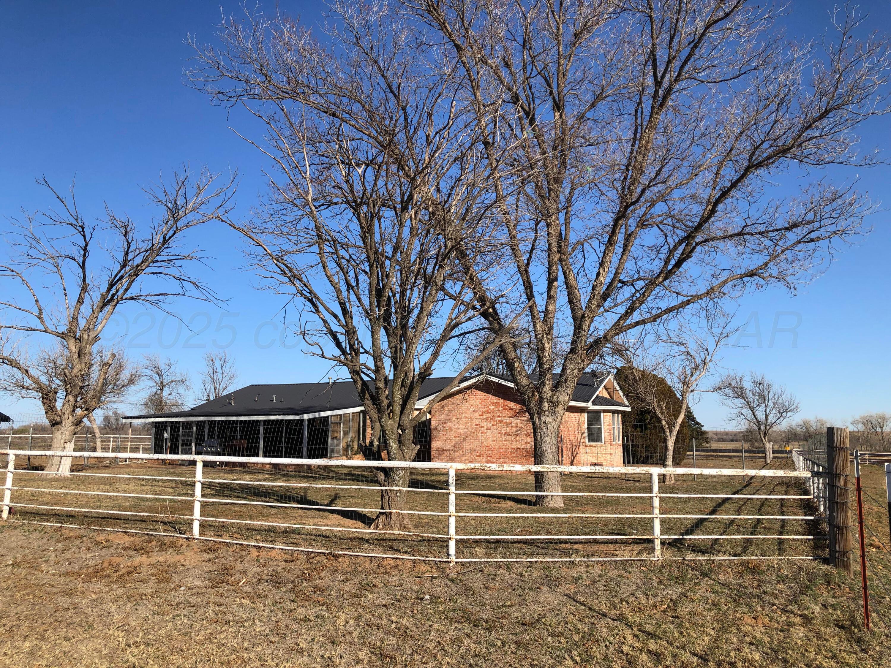 4205 Highway 83 Wellington, TX 79095 - Photo 42 of 52 a view of outdoor space with trees