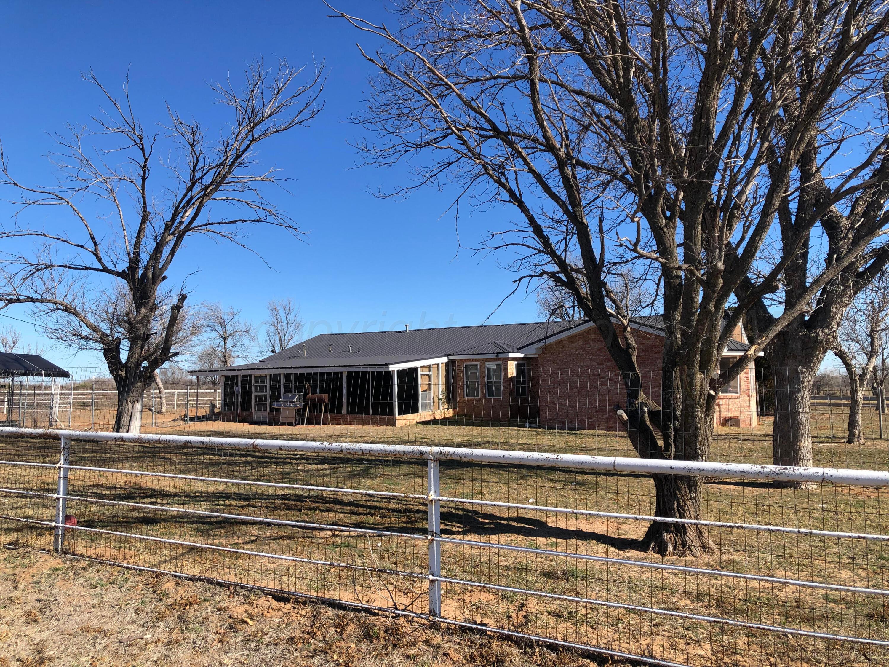 4205 Highway 83 Wellington, TX 79095 - Photo 47 of 52 a view of a house with a large tree