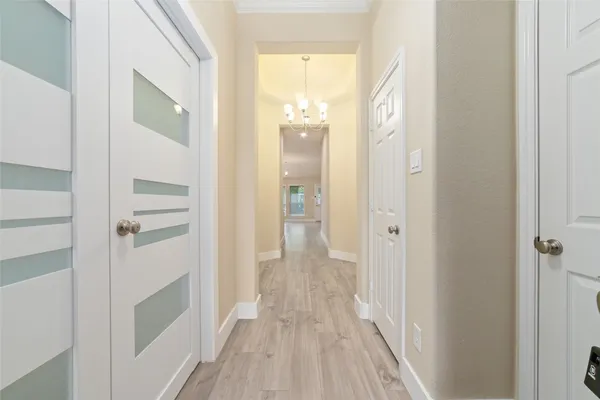 a view of a bathroom from the hallway