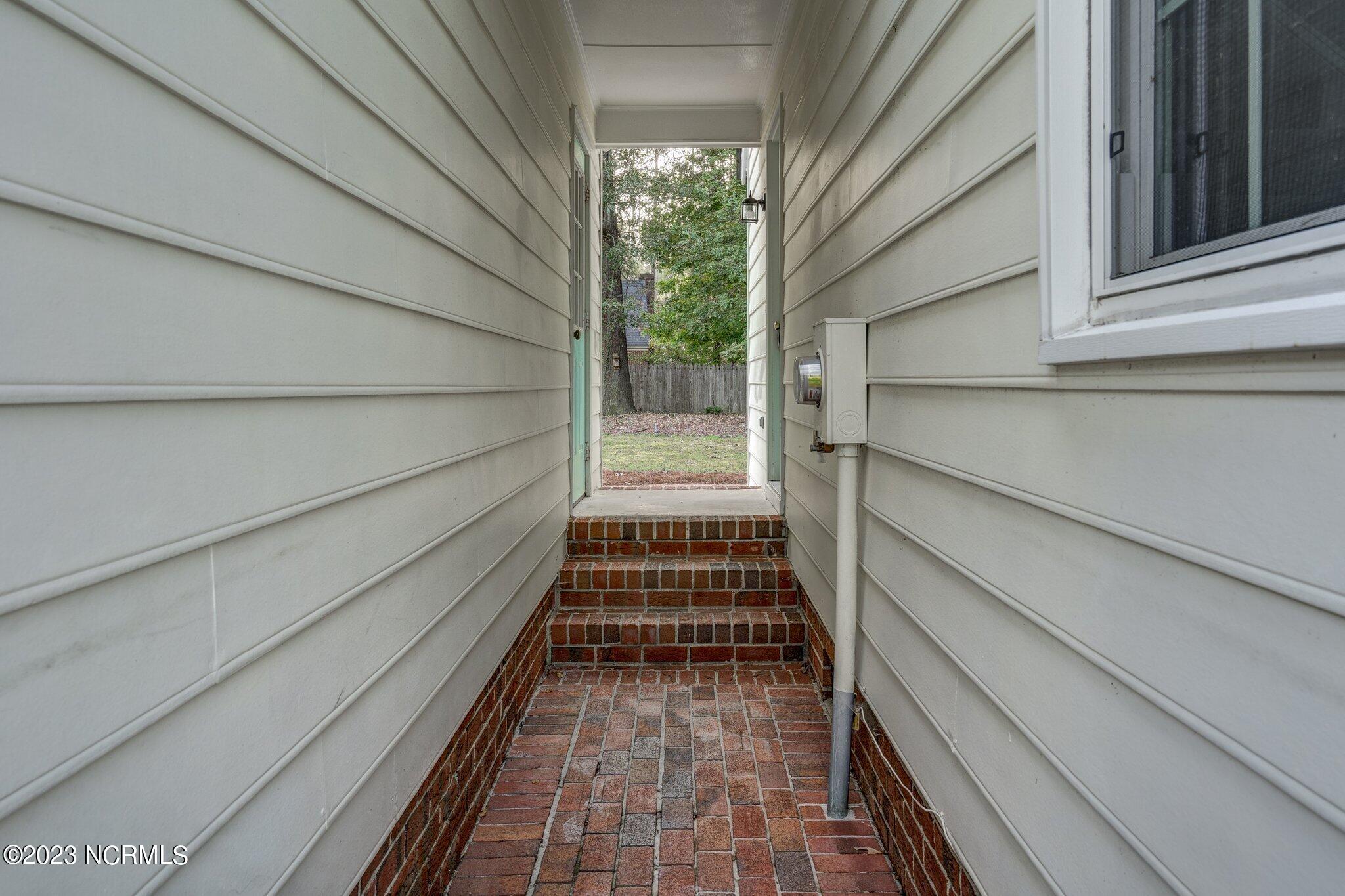 3825 Providence Road Rocky Mount, NC 27803 - Photo 5 of 37 Breezeway to Backyard