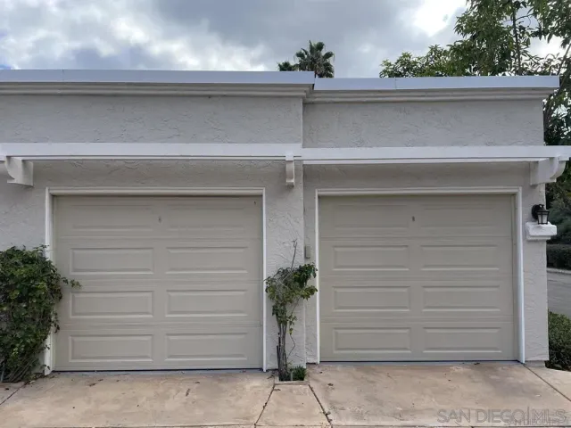 a close view of a house with a garage