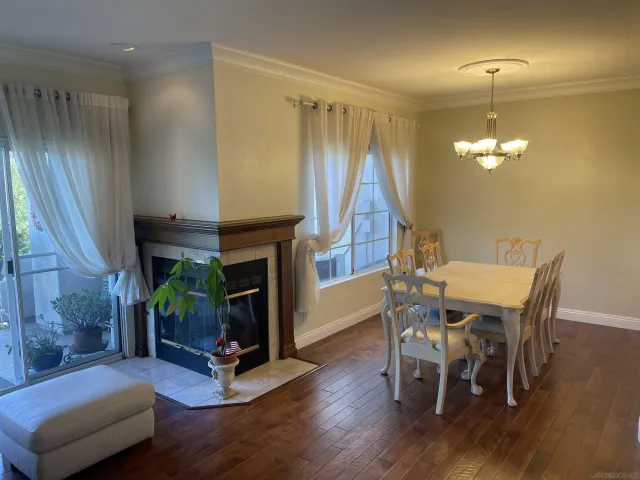 a view of a livingroom with furniture and a fireplace
