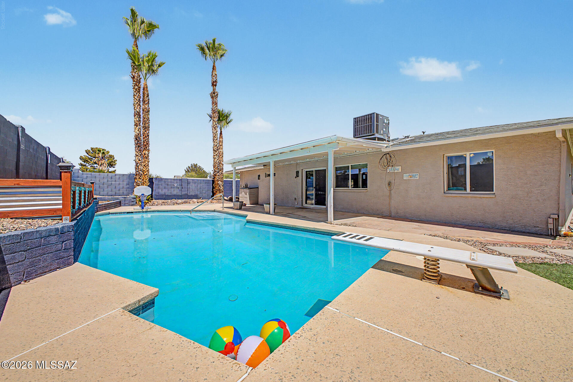 7550 East Rio Verde Drive Tucson, AZ 85715 - Photo 1 of 25 From swaying palm trees to a sparkling pool and vibrant outdoor living spaces, this is where Arizona summers shine brightest.