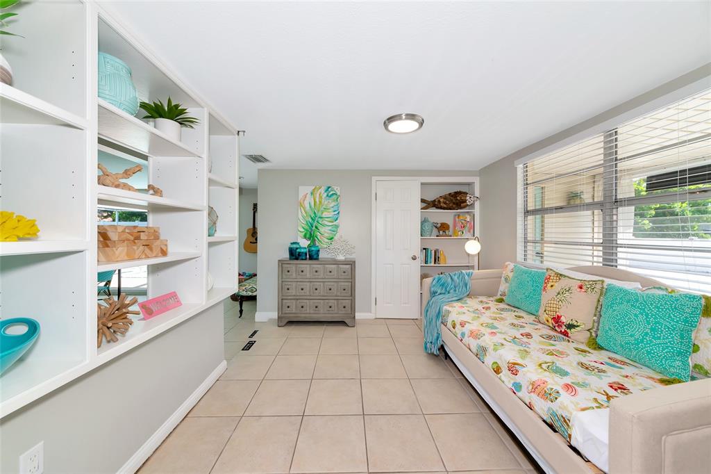 5948 Mirror Lake Road Sarasota, FL 34233 - Photo 17 of 50 a bedroom with bed and window