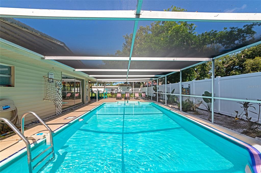 5948 Mirror Lake Road Sarasota, FL 34233 - Photo 35 of 50 a view of a backyard