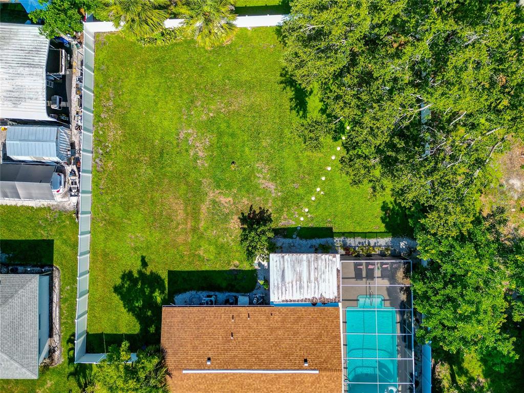 5948 Mirror Lake Road Sarasota, FL 34233 - Photo 44 of 50 aerial view of a house with a yard