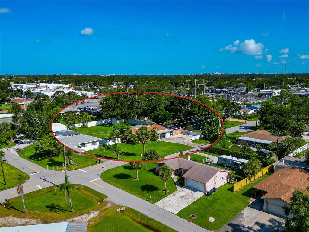 5948 Mirror Lake Road Sarasota, FL 34233 - Photo 45 of 50 an aerial view of residential houses with outdoor space and trees