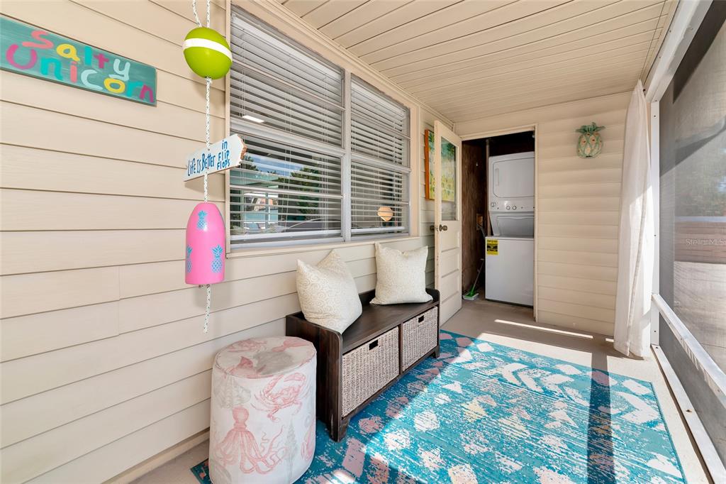 5948 Mirror Lake Road Sarasota, FL 34233 - Photo 6 of 50 a bathroom with a sink and bathtub