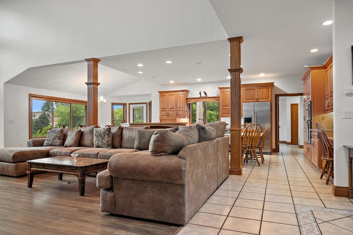 10739-451 North 1300 E Road Chenoa, IL 61726 - Photo 11 of 55 a living room with furniture and a fireplace