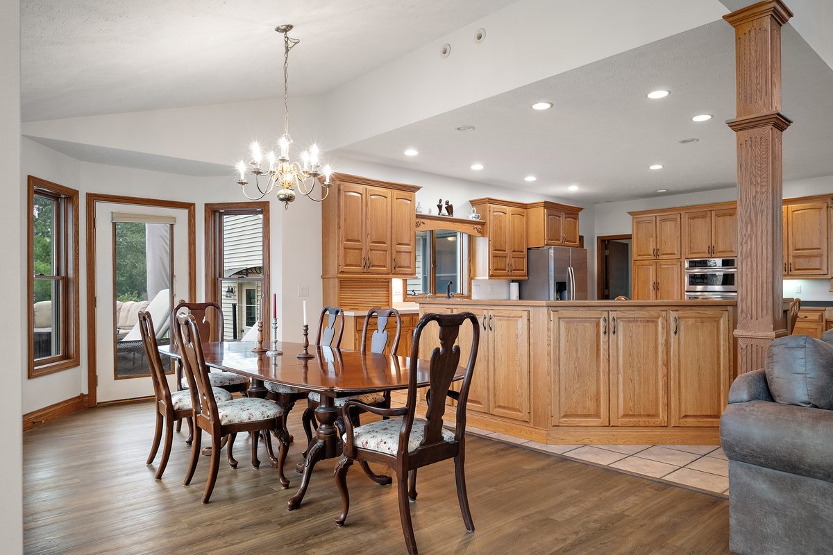 10739-451 North 1300 E Road Chenoa, IL 61726 - Photo 17 of 55 a view of a dining room with furniture window and wooden floor