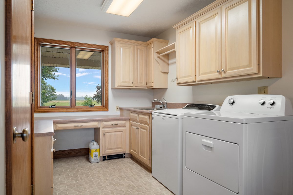 10739-451 North 1300 E Road Chenoa, IL 61726 - Photo 23 of 55 a utility room with dryer and washer